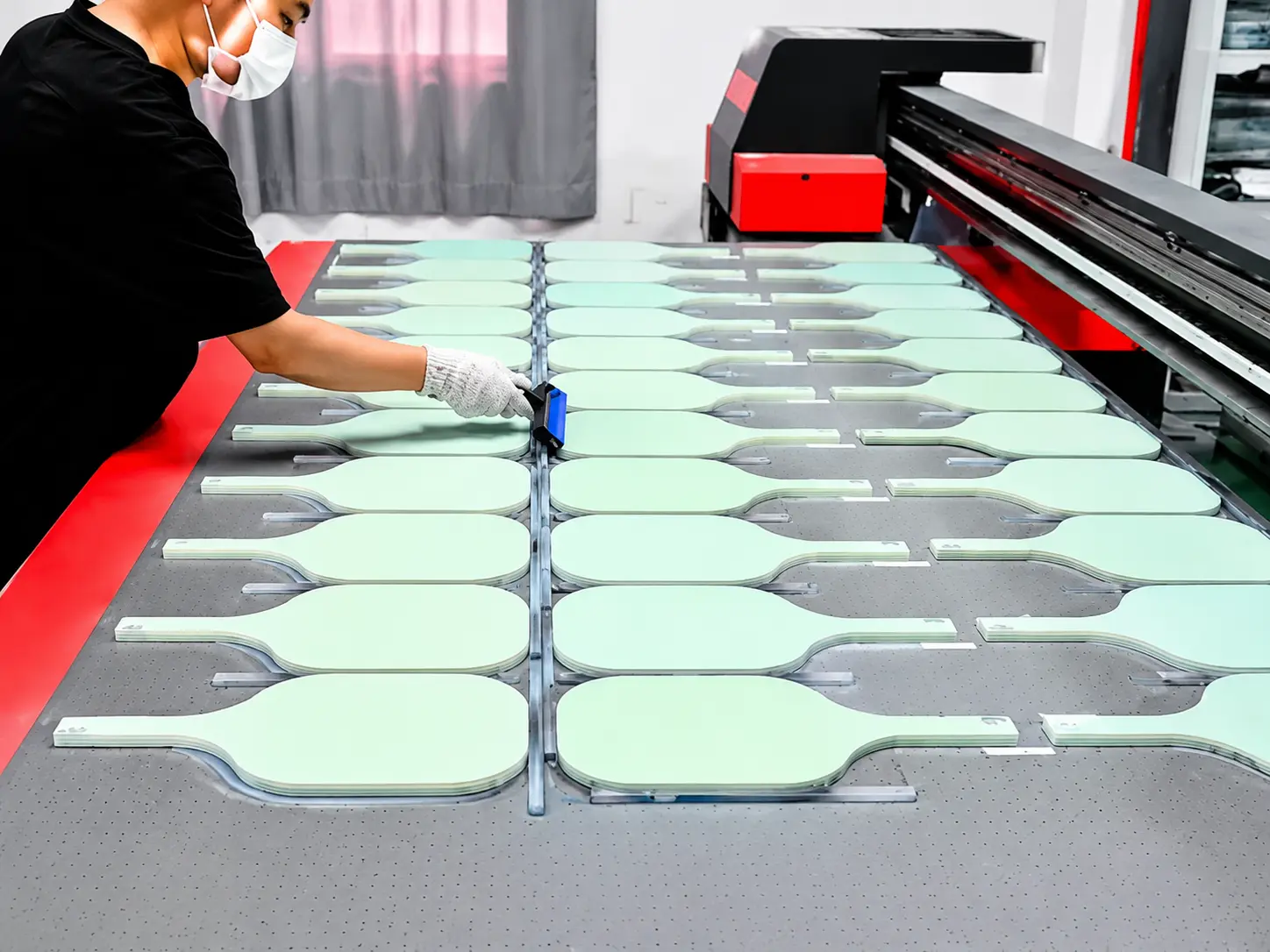 Machine sanding process for OEM pickleball paddles in our factory